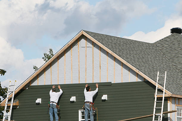 Professional Siding technician working in Rockville, MD